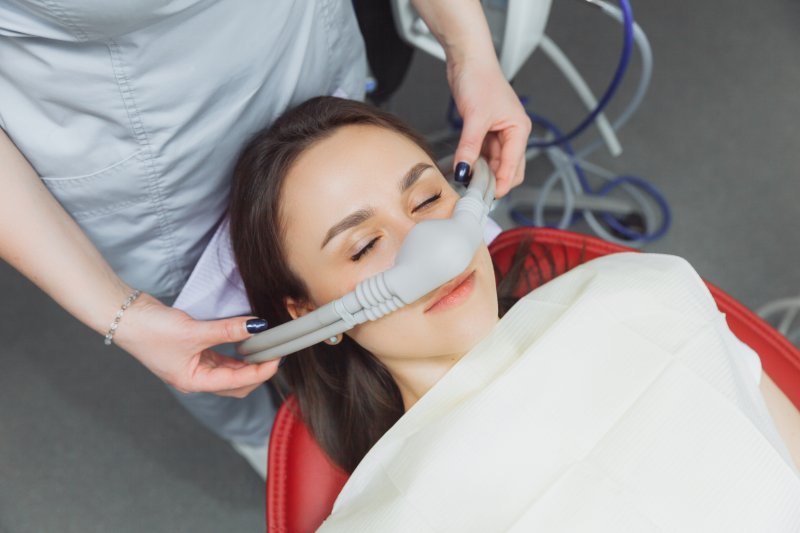 female patient receiving nitrous oxide